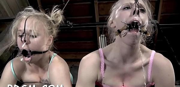  Gagged and tied up beauty gets her clits gratified
